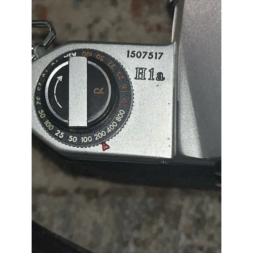 Vintage Honeywell Pentax 35 Mm Camera Features A Classic Silver And Black Finish